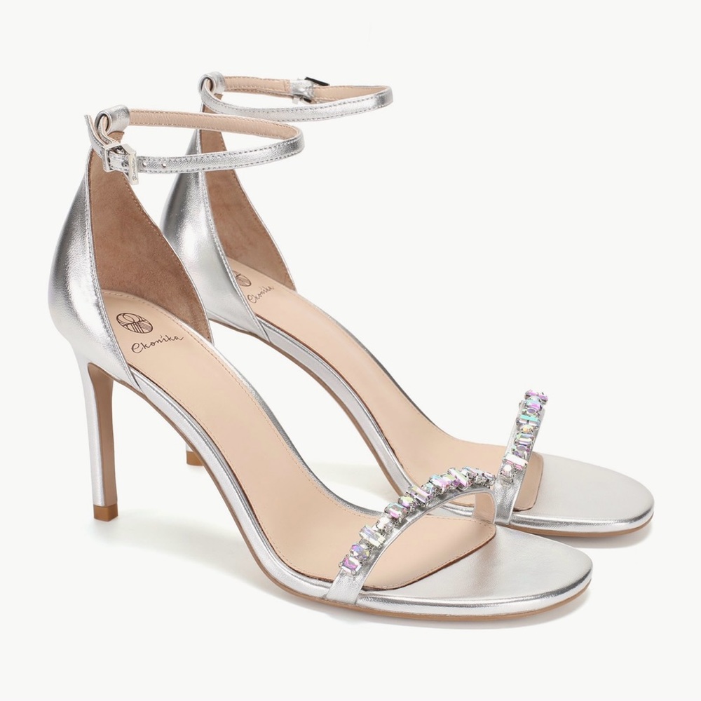 Nice silver shoes. NEW - never used. Just a big size for me